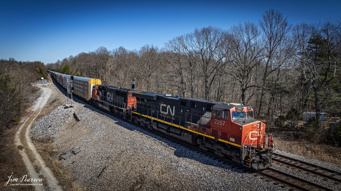 Canadian National 2257 leads CSX X217 empty autorack train southbound at Kelly, Kentucky on March 11th, 2025, on the CSX Henderson Subdivision. The train is running as an extra M217 as it makes its way from Philadelphia, PA to Louisville, Ky.

Tech Info: DJI Mavic 3 Classic Drone, RAW, 22mm, f/2.8, 1/1600, ISO 100.

#railroad #railroads #train, #trains #railway #railway #railtransport #railroadengines #picturesoftrains #picturesofrailways #besttrainphotograph #bestphoto #photographyoftrains #bestsoldpicture #JimPearsonPhotography #trainsfromadrone #csxhendersonsubdivision #onecsx