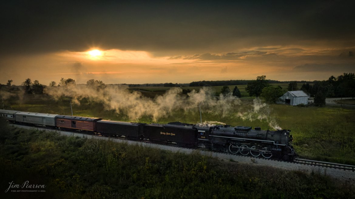 August 30th, 2024, Steam locomotive Nickel Plate 765 pulls “The Limited” through the countryside at sunset as they approach Ray, Indiana on their way to Reading, Michigan as part of Indiana Rail Experience’s Rolling Victory Weekend,

According to their website: Rolling Victory was a three-day living history event celebrating American military, railroad, and home front history featuring vintage train rides, World War II reenactors, battles, a big band orchestra, and an immersive and educational experience for all ages in Pleasant Lake, Indiana.

Tech Info: DJI Mavic 3 Classic Drone, RAW, 24mm, f/11, 1/800, ISO 800.

#railroad #railroads #train, #trains #railway #railway #steamtrains #railtransport #railroadengines #picturesoftrains #picturesofrailways #besttrainphotograph #bestphoto #photographyoftrains #bestsoldpicture #JimPearsonPhotography #steamtrains #nkp765 #passengertrains #trainsfromtheair #trainsfromadrone