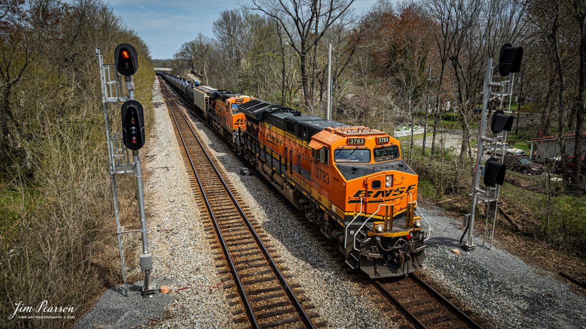 BNSF 3783 leads loaded ethanol train B797 as they pass the signals at the south end of Nortonville, Kentucky on March 28th, 2025, on the CSX Henderson Subdivision as it heads south.

Tech Info: DJI Mavic 3 Classic Drone, RAW, 22mm, f/2.8, 1/2000, ISO 100.

#railroad #railroads #train, #trains #railway #railway #railtransport #railroadengines #picturesoftrains #picturesofrailways #besttrainphotograph #bestphoto #photographyoftrains #bestsoldpicture #JimPearsonPhotography #trainsfromadrone #csxhendersonsubdivision #onecsx #bnsf